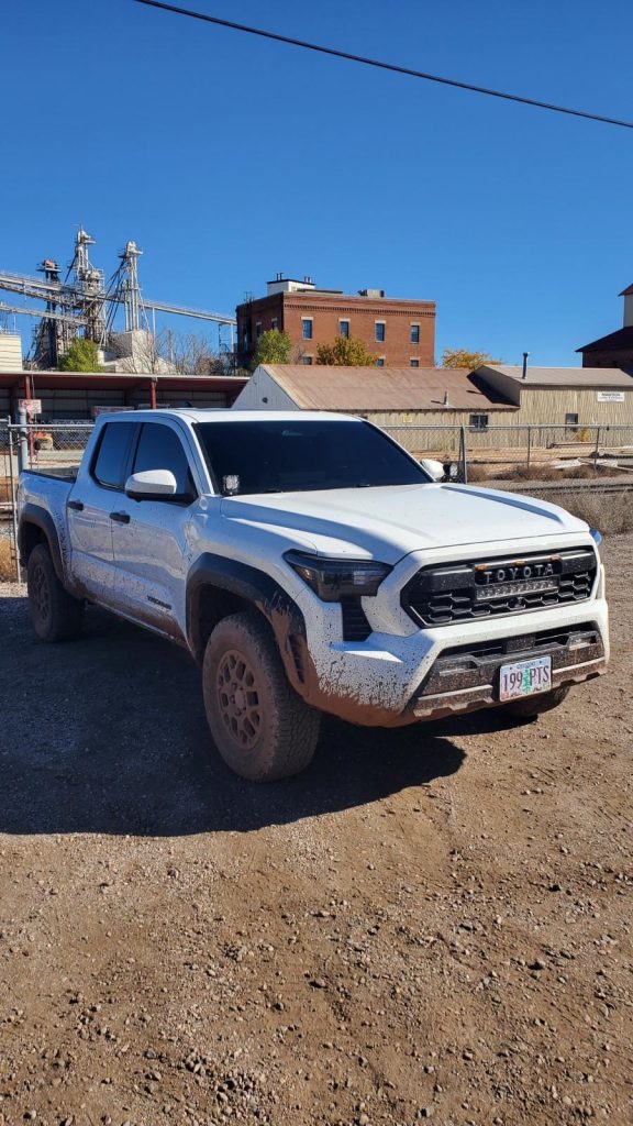 Ceramic Window Tint Installation on White Toyota Tacoma in Lakewood, CO
