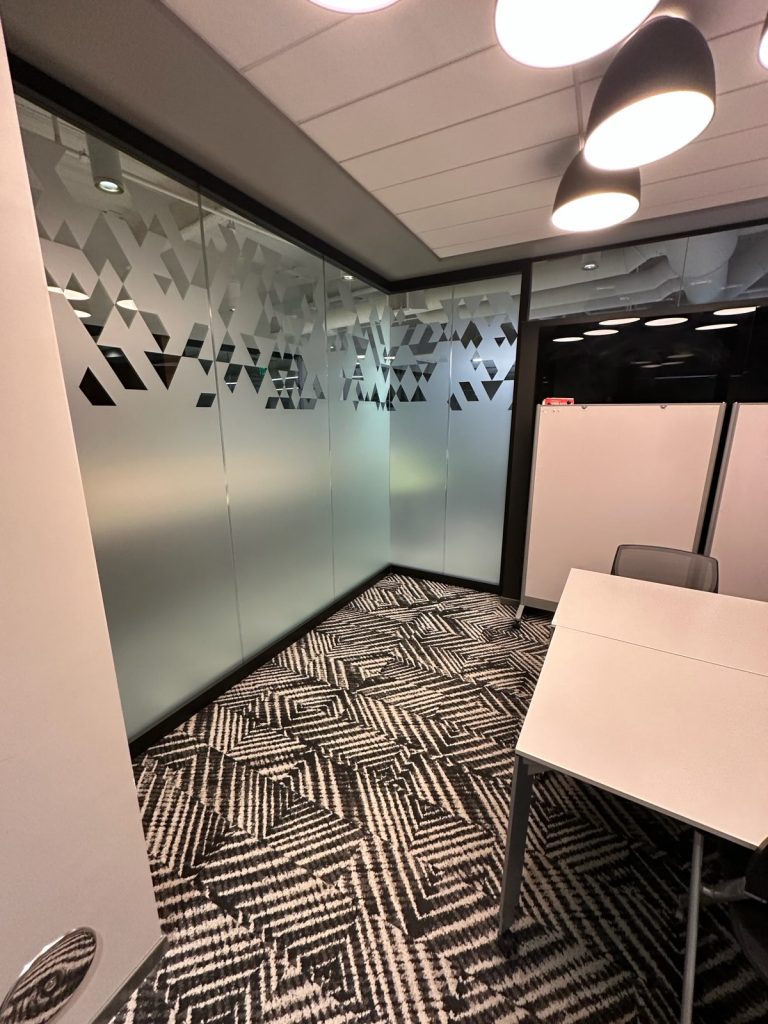 Commercial Office Frosted Conference Room Tint with a custom design in Downtown Denver